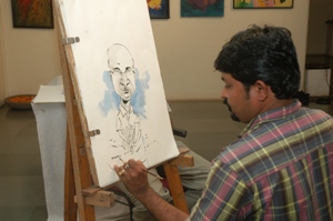 Cartoon painting demonstration by Manoj Salunkhe at Artfest 09, Indiaart Gallery